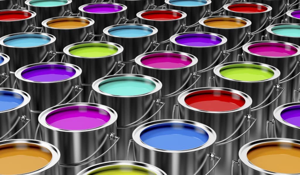 collection of paint cans with colored paints